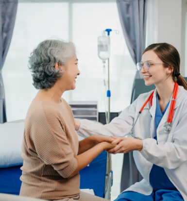 Doctor discussing diabetes treatment options with a patient in a clinical setting.