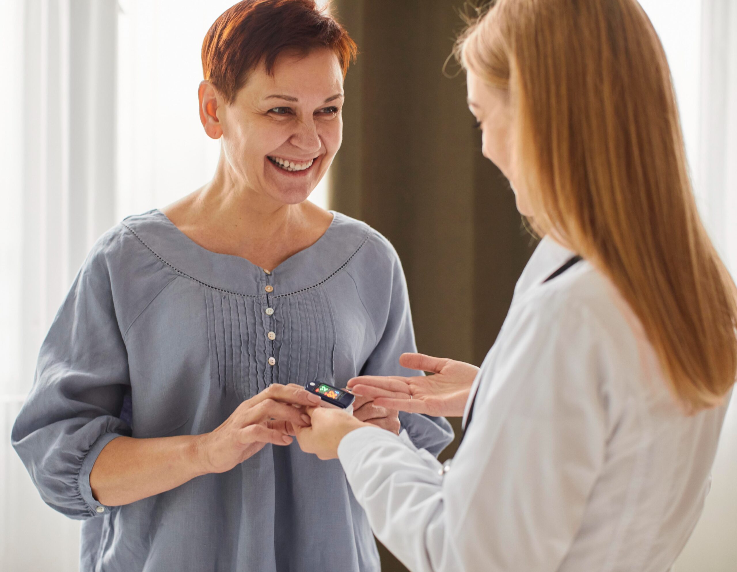 Doctor handing medication to a patient, emphasizing care and support in managing diabetes.