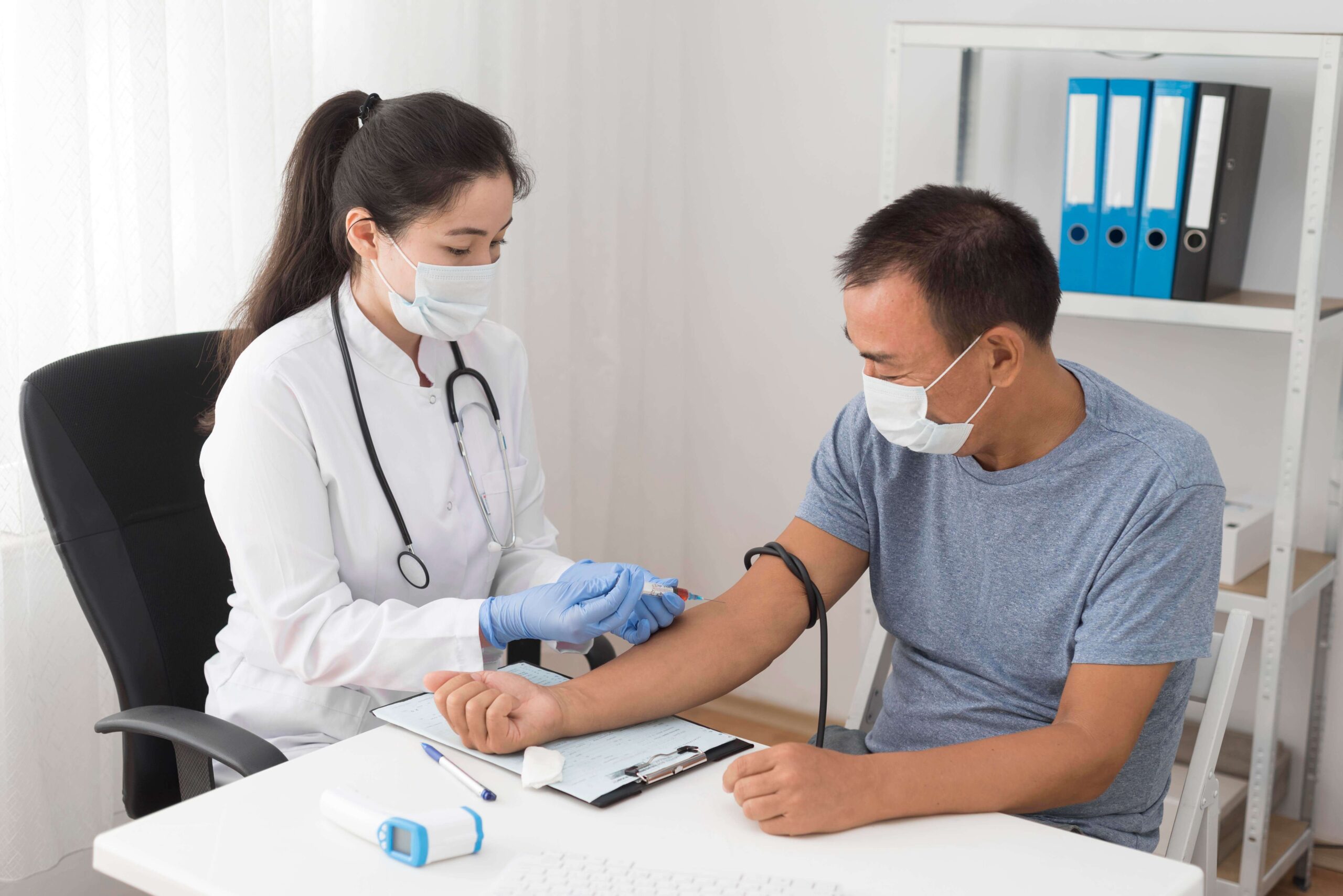 Healthcare provider administering an injection to a patient during a consultation on prior authorization for diabetes medication.