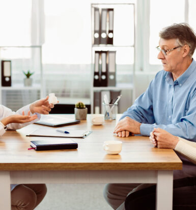 Doctor discussing COPD treatment options with Clotrimazole Aerosol with a patient.