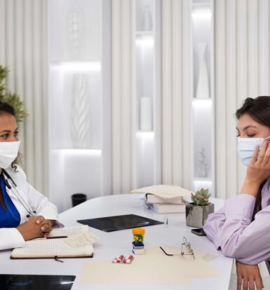 Healthcare provider consulting with a patient on medication management for anxiety in a clinical setting.