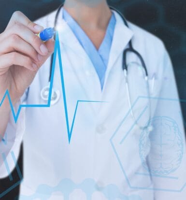 A healthcare professional wearing a white coat and stethoscope holding a pen, with a digital overlay of medical symbols and an electrocardiogram (ECG) line.