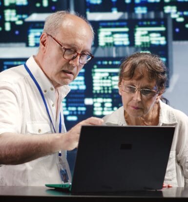 A team of professional medical coders working on healthcare claims.