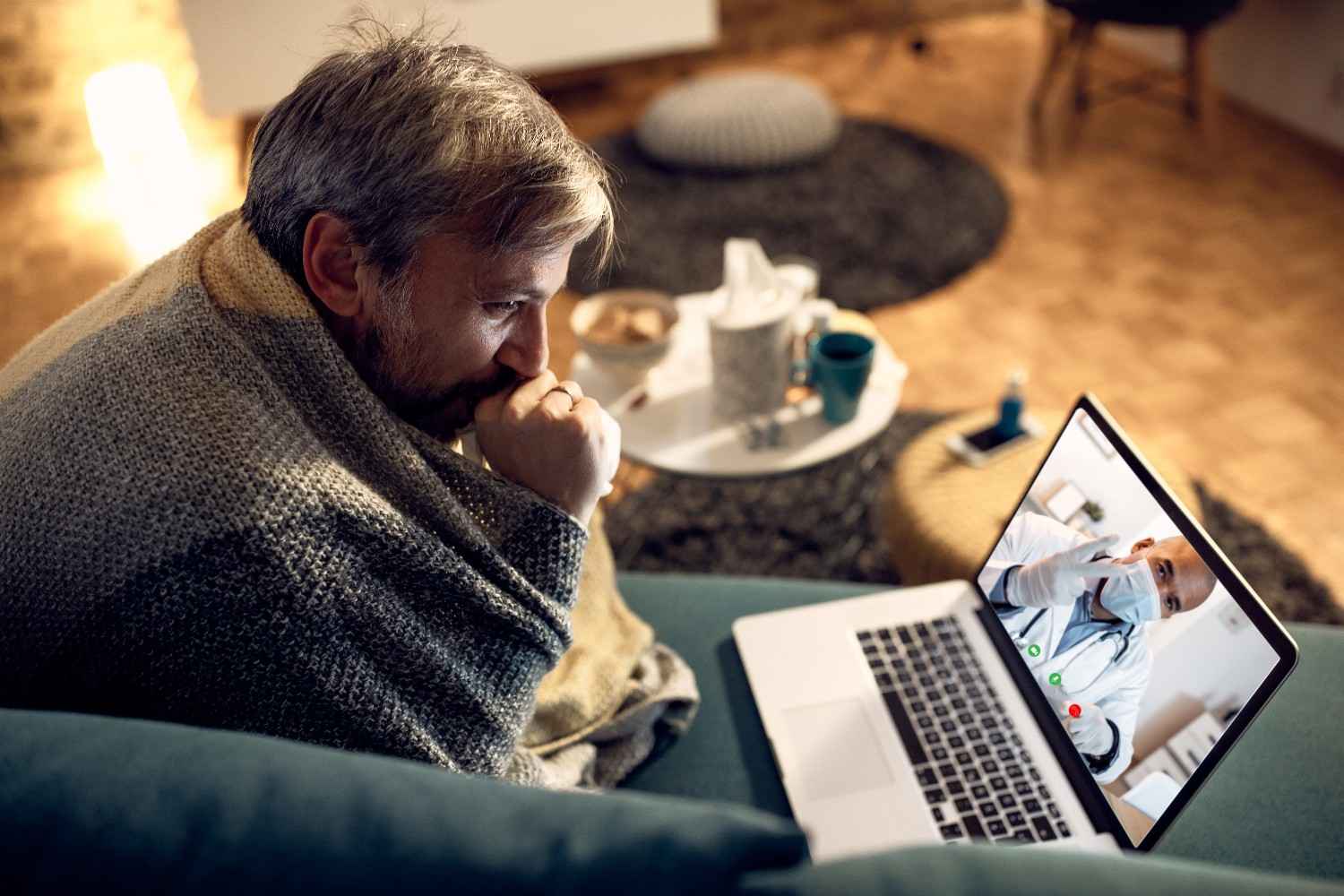 A patient consulting a doctor online via telemedicine, representing the benefits of Virtual Medical Assistants in improving healthcare efficiency.