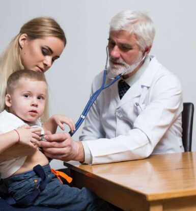 Doctor assessing young child for Dupixent prior authorization.