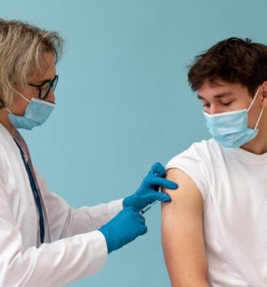 Healthcare provider administering an injection to a patient during growth hormone therapy, highlighting prior authorization processes.