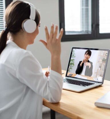 A healthcare professional engaging in a video consultation with a virtual medical assistant, showcasing remote administrative support in healthcare.