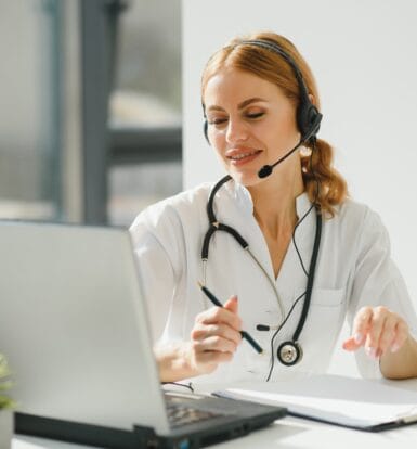 Healthcare provider assisting patient with outsourcing prior authorizations.