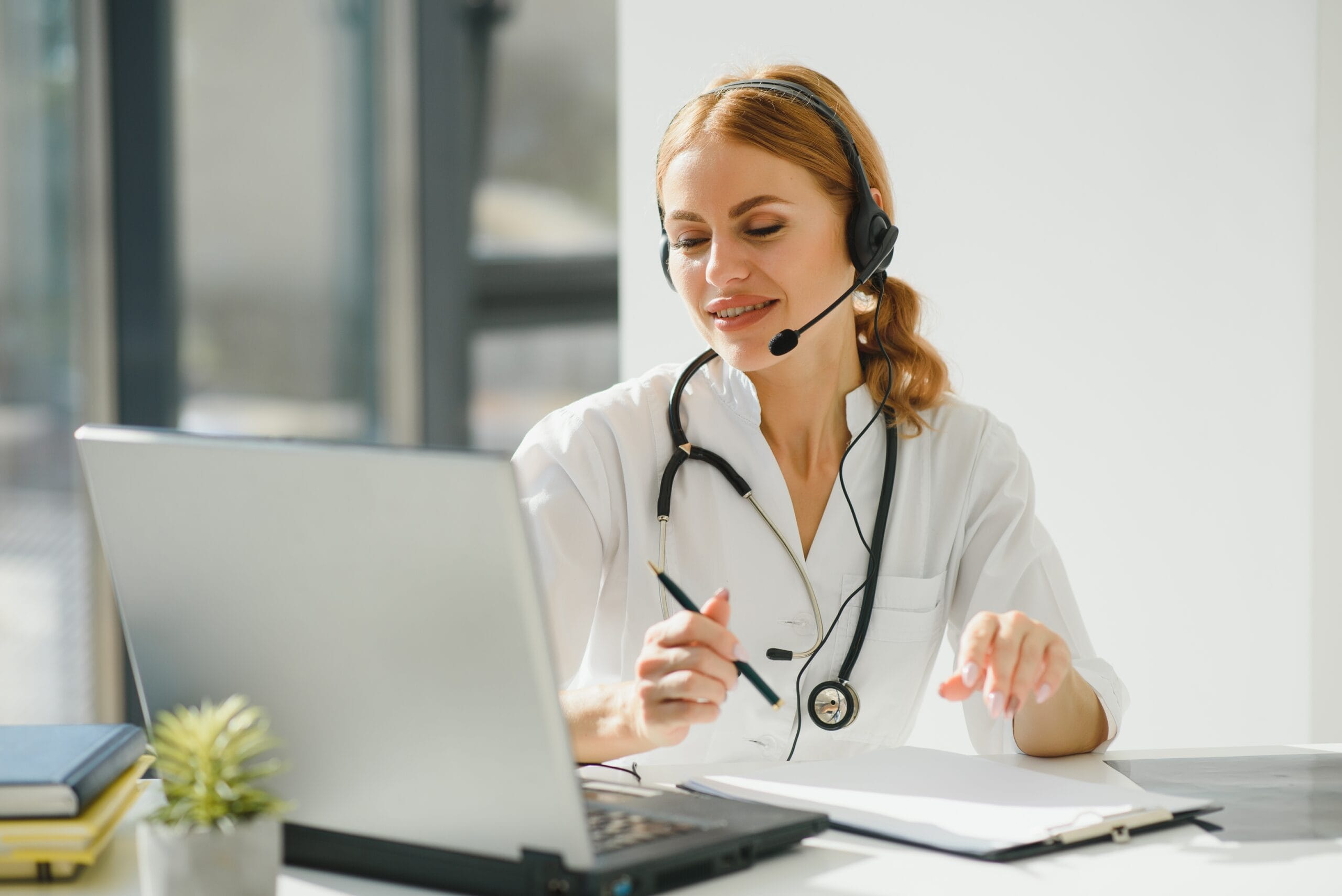 Healthcare provider assisting patient with outsourcing prior authorizations.