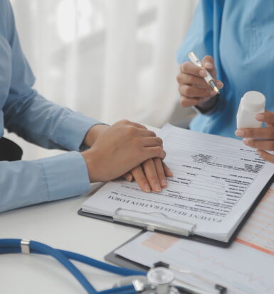 A healthcare provider reviewing medical records for prior authorization