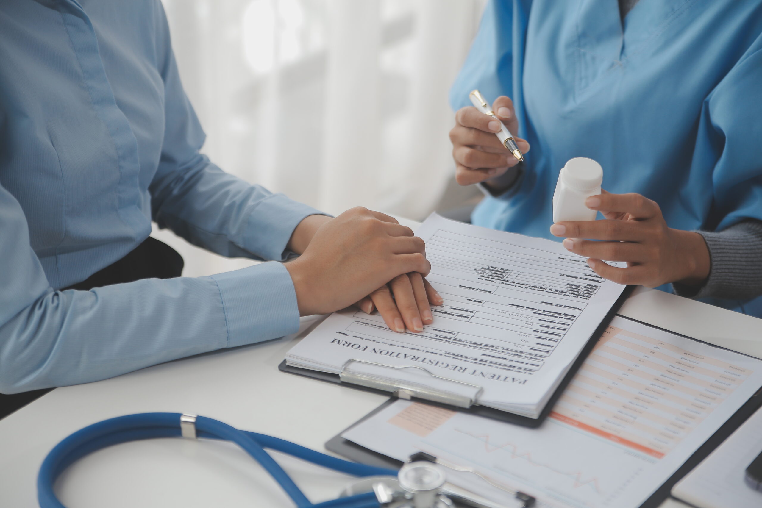 A healthcare provider reviewing medical records for prior authorization