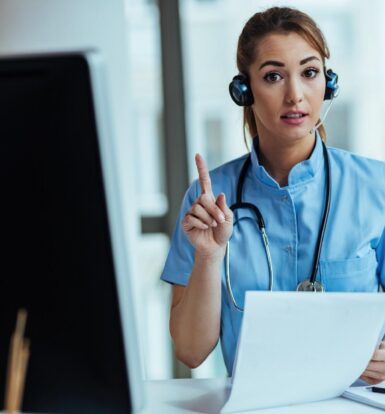 A virtual medical receptionist wearing a headset and holding paperwork, providing professional remote assistance to a healthcare practice.