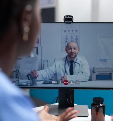 Doctor conducting a virtual consultation with a patient, representing the role of a Virtual Medical Assistant in healthcare