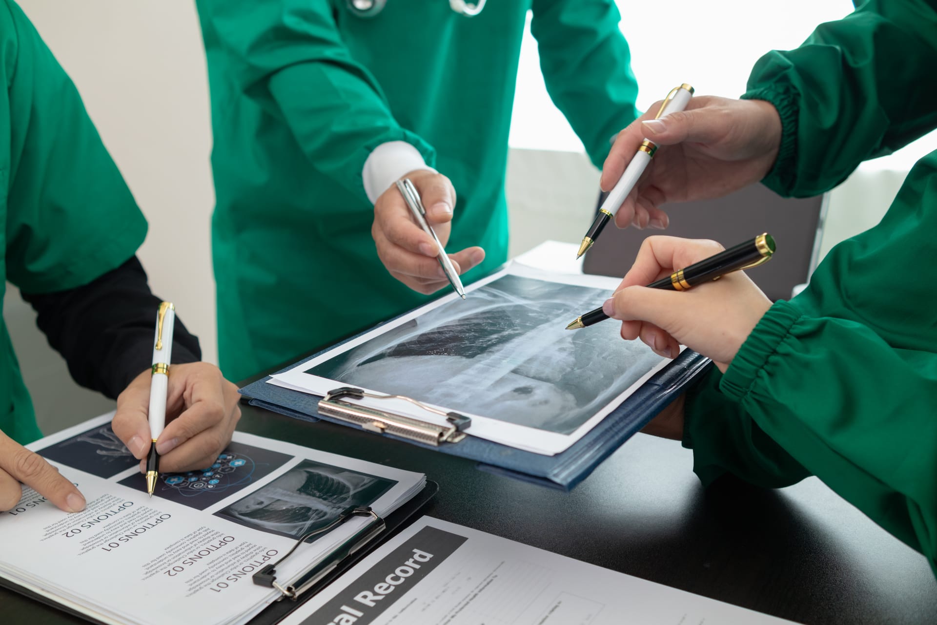 Medical coder analyzing charts in a rural clinic