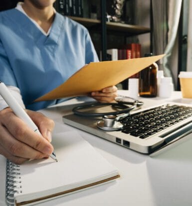 A virtual scribe working with an EHR system on a computer screen.