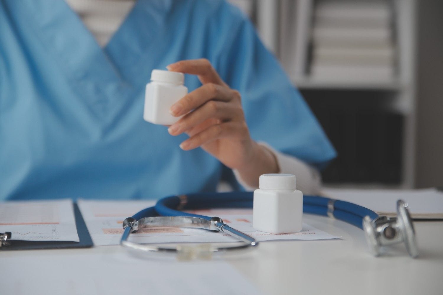 Medical coder reviewing patient records for value-based care