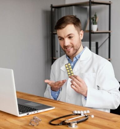 Healthcare professional reviewing billing documents with a consultant.