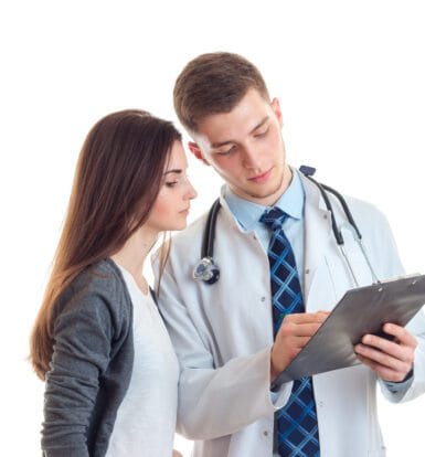 A virtual medical assistant handling prior authorization forms on a computer.