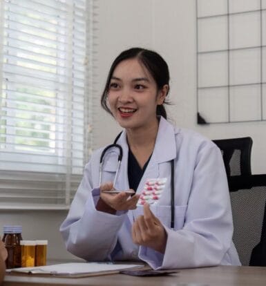 A healthcare professional reviewing billing documents in a long-term care facility.