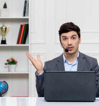 Man with a headset providing virtual support, representing virtual healthcare staff services like prior authorization assistance.