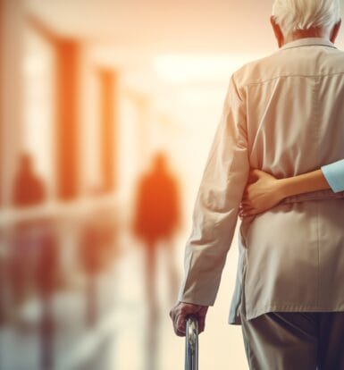 A healthcare administrator reviewing billing documents in a long-term care facility.