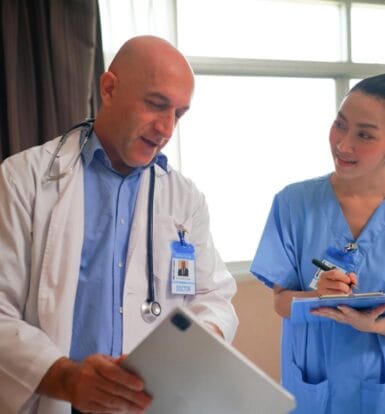 A medical scribe working alongside a physician in New York.