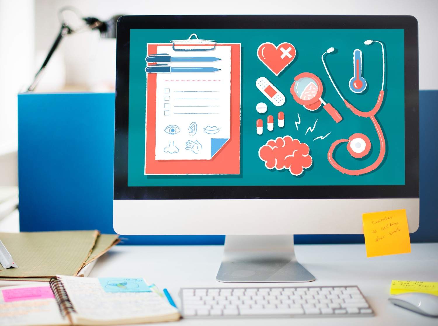 Digital tools for healthcare providers displayed on a desktop screen, highlighting medical icons like a stethoscope, clipboard, and heart.