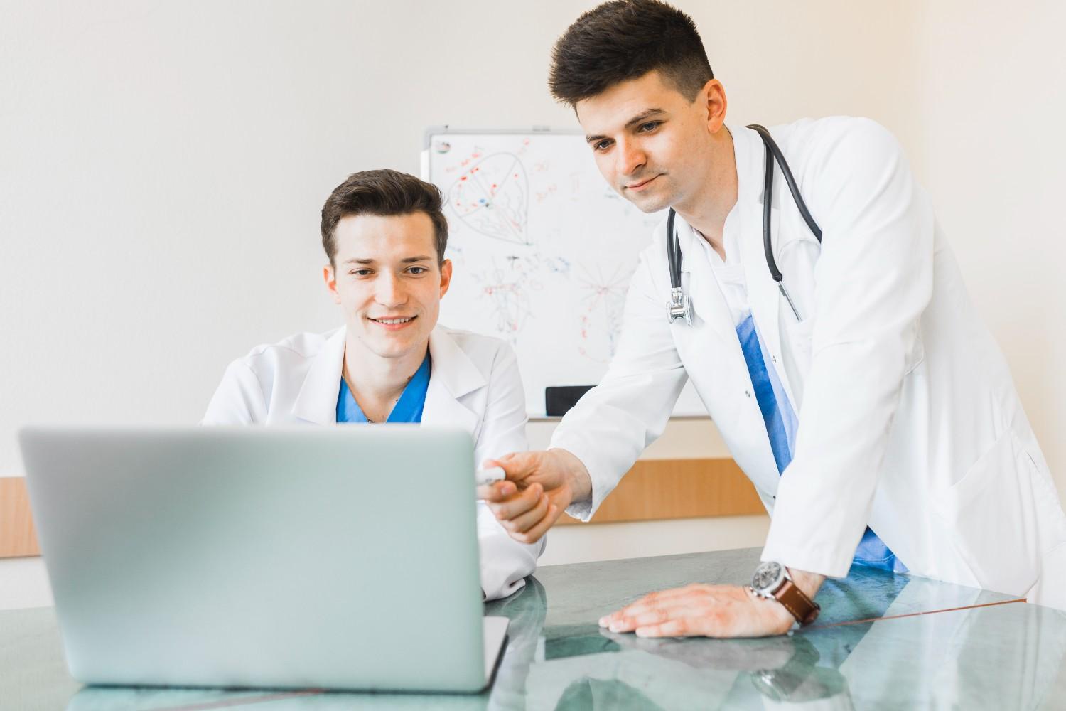 A medical coder working remotely in South Carolina with a laptop.