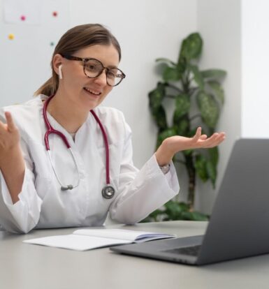 Doctor engaging with a Medical Virtual Assistant via video call to streamline administrative tasks and improve patient care.