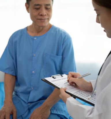 Medical scribe assisting a Florida healthcare provider during patient care.