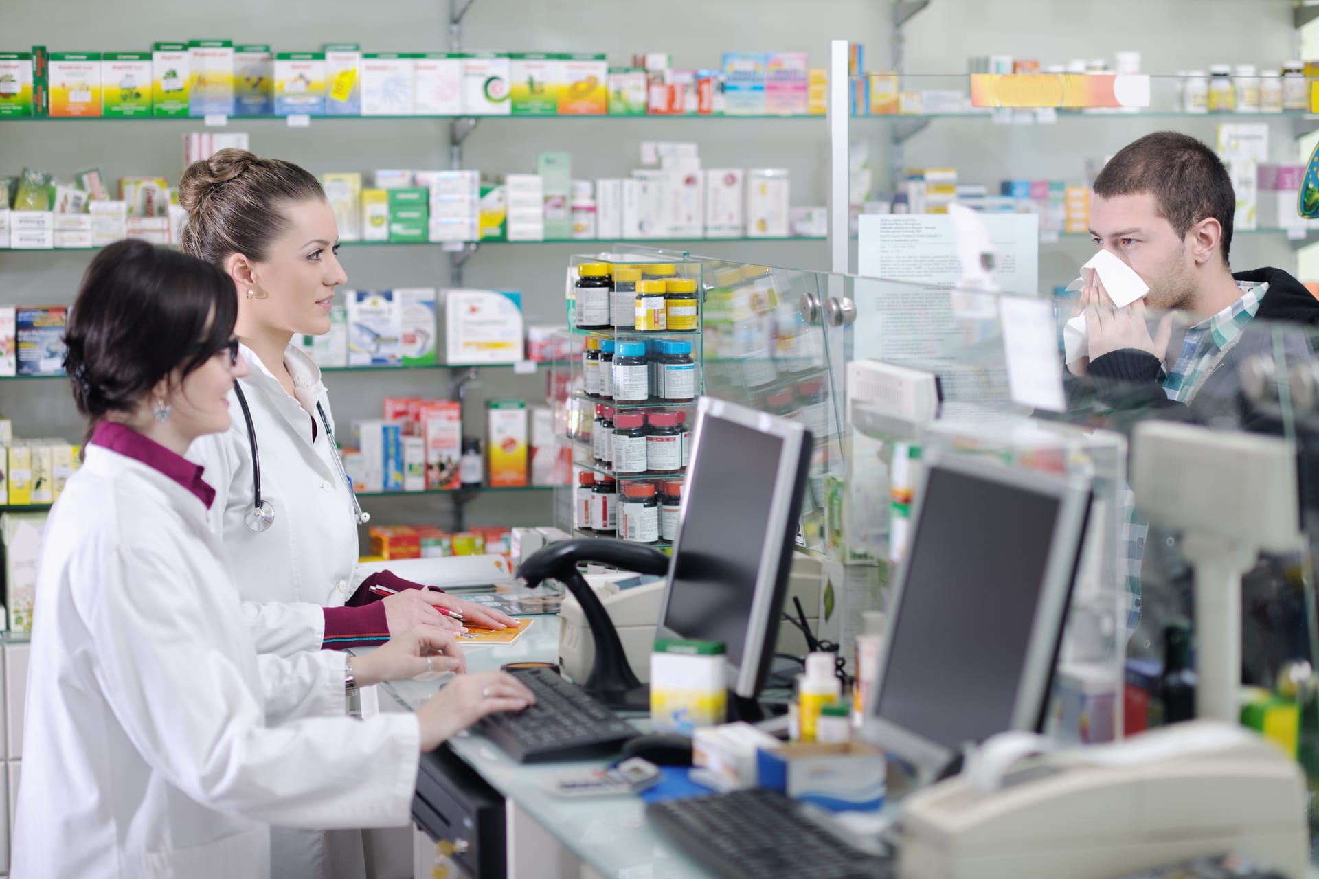 Healthcare provider and pharmacy collaborating on prior authorization process in North Carolina, streamlining workflows with virtual assistants.