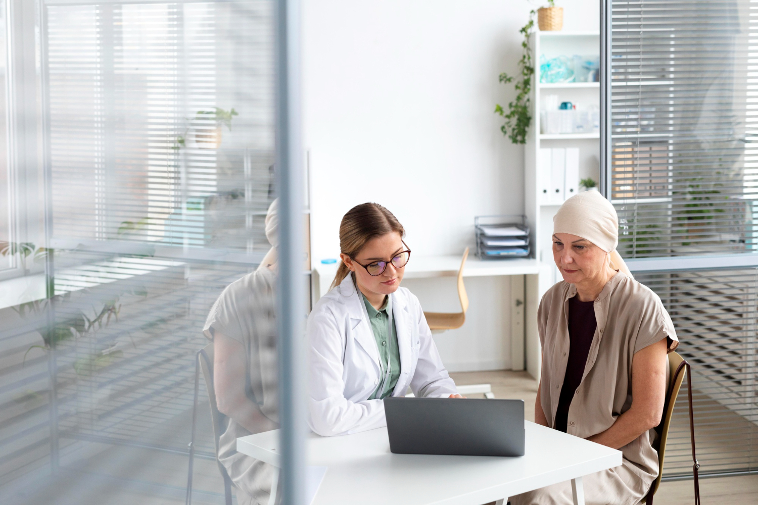 A medical scribe assisting a physician in documenting a patient encounter in Delaware.