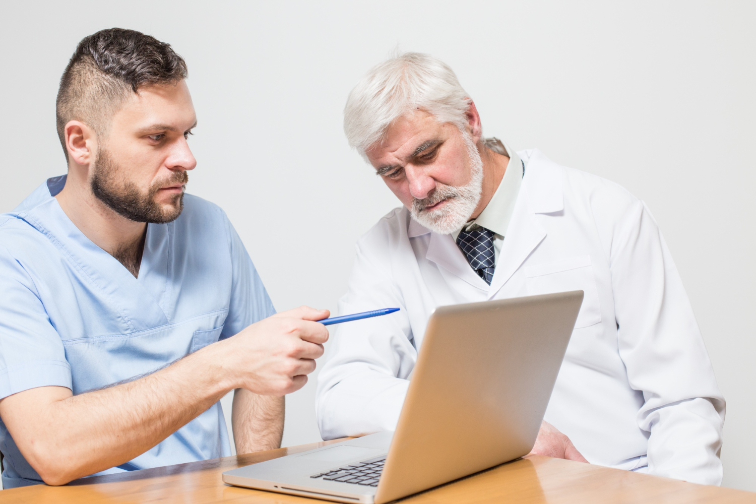 A healthcare researcher analyzing medical coding data on a computer screen.