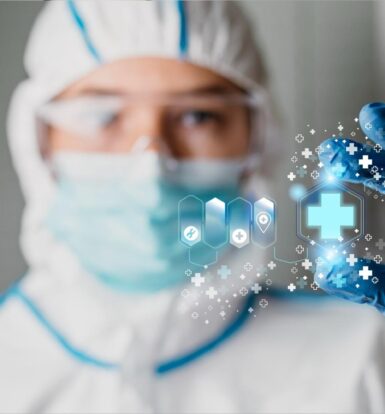 Healthcare professional in protective gear holding a digital medical interface symbolizing HIPAA compliance and data security.