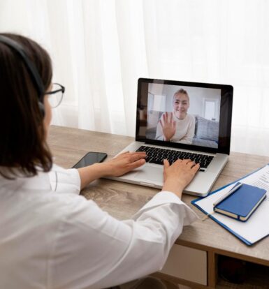 Virtual medical assistant providing online patient support via video call.